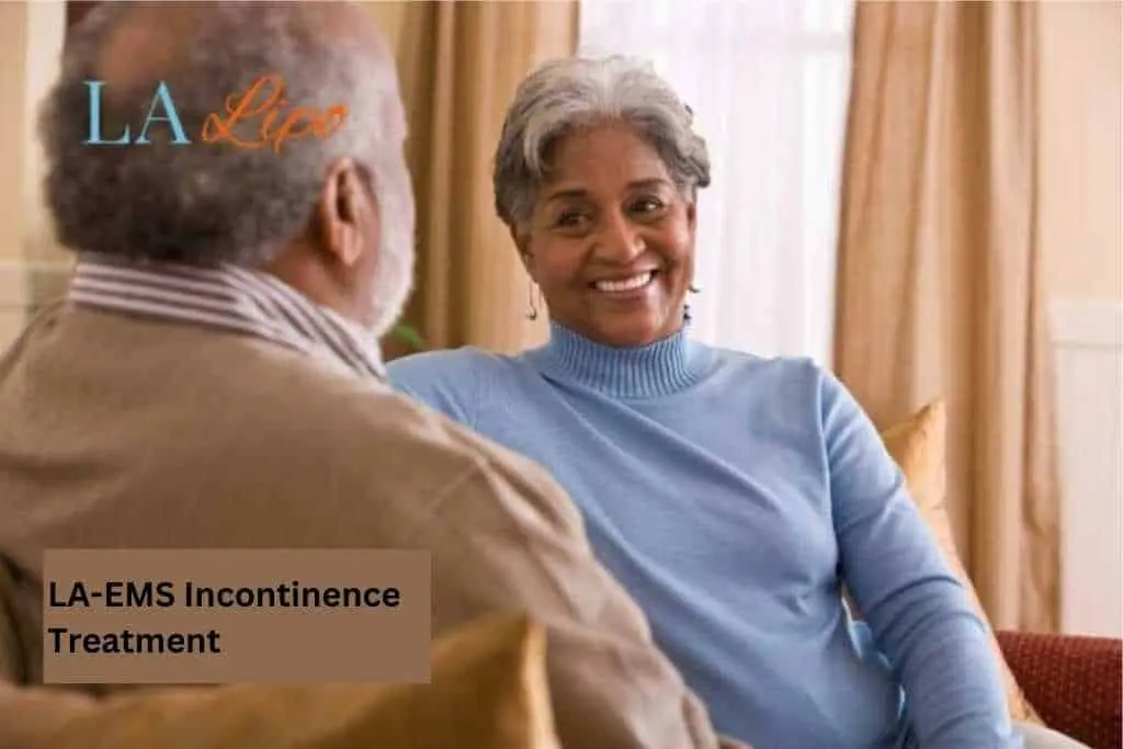 Couple sat smiling at each other - LA-EMS treatment Hammersmith and Fulham