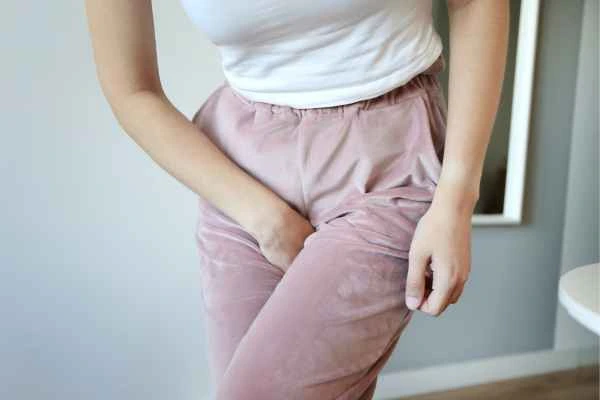 woman struggling with urine incontinence Hammersmith and Fulham